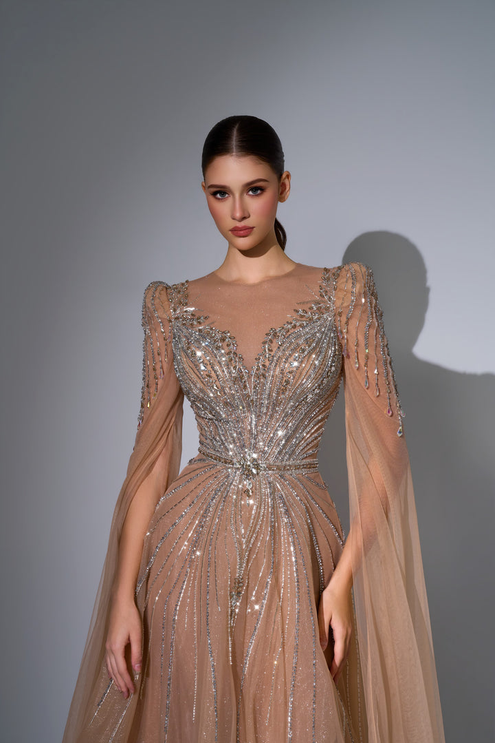 Delilah LD11670 Illusion Neck Long Sleeve Cape Beaded A-Line Gown - Champagne close-up view