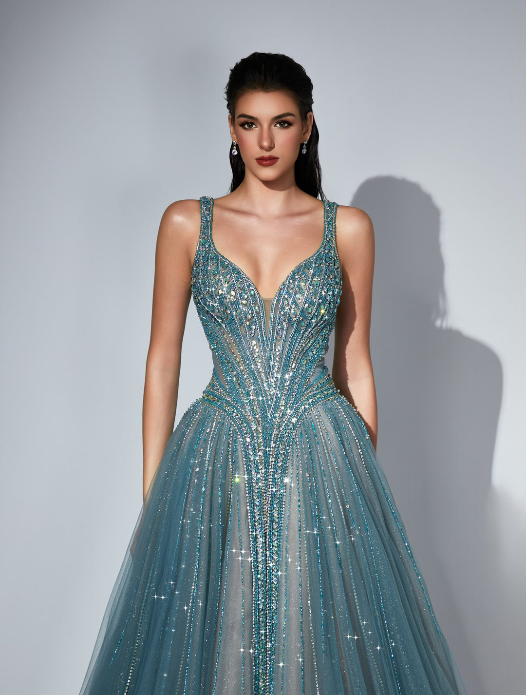 Delilah LD11533 Plunging V Crystal Corset Ball Gown with Tulle Skirt - Green close-up view