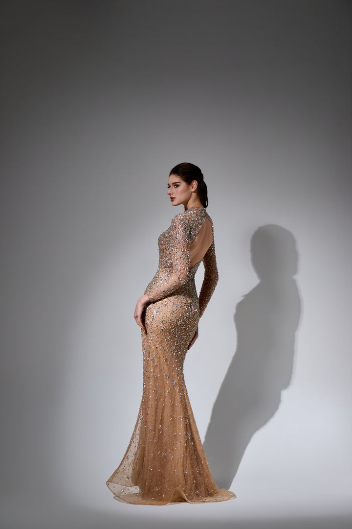 Delilah LD21193 Long Sleeve High Neck Sequin Sheath Gown with Cut-Out and Slit - Champagne back view