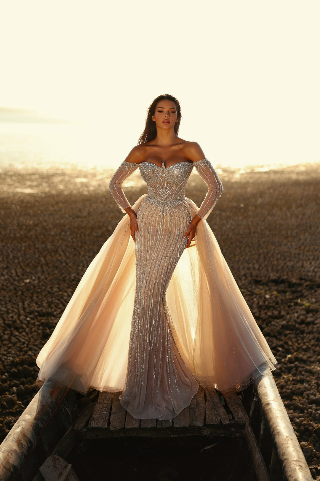 Delilah LD11539 Off-the-Shoulder Long Sleeve Beaded Corset Sheath Gown with Sparkle Overskirt - White front view