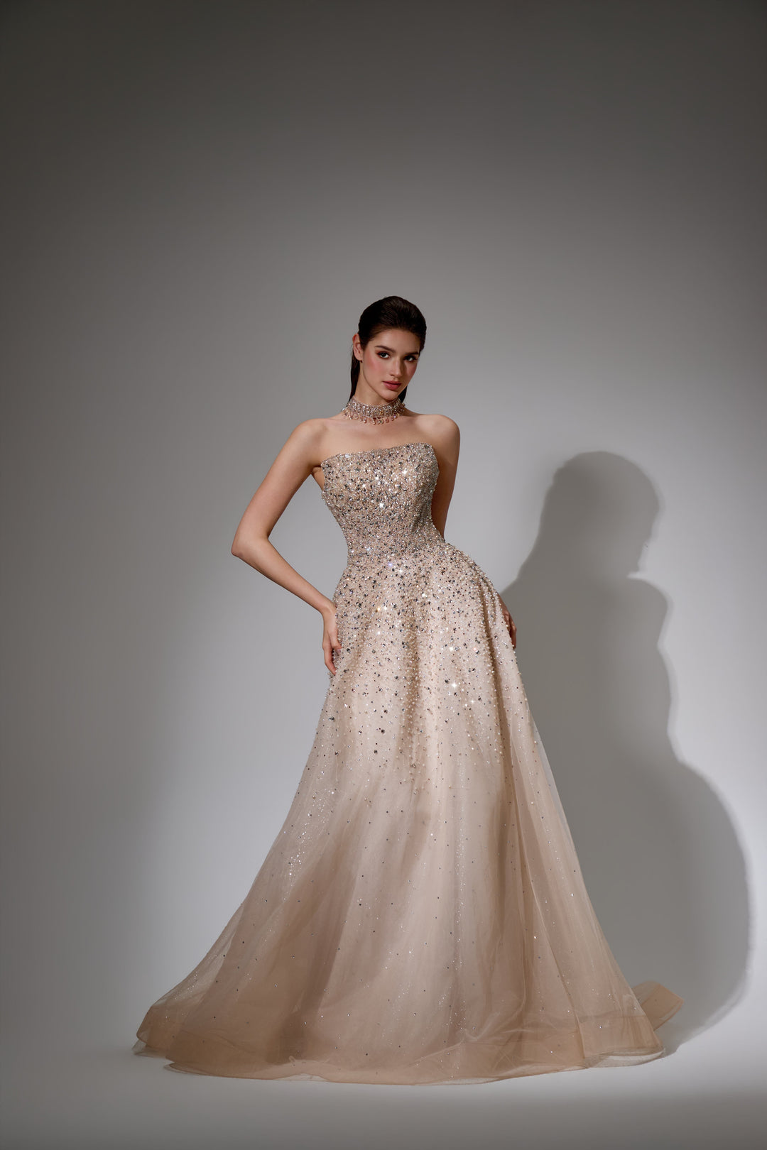 Delilah SH12020 Strapless Sequin Bodice A-Line Gown with Sparkle Skirt - Champagne front view